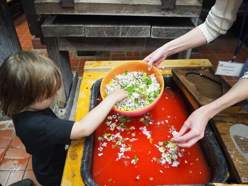 For this paper sheet, Liam is even allowed to sprinkle a few flowers into the water, i.e. later into the paper.