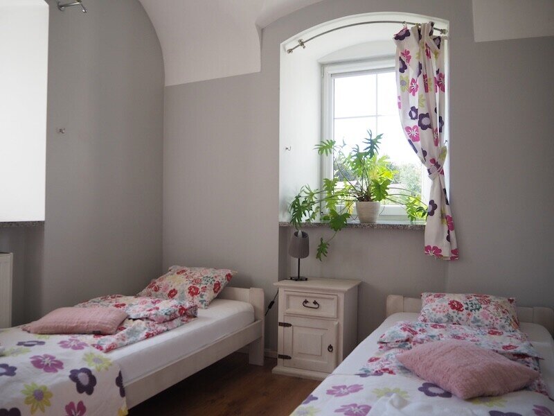 Sleeping at Kowalowe Wzgórze: A view of the kids' room in our large holiday flat.